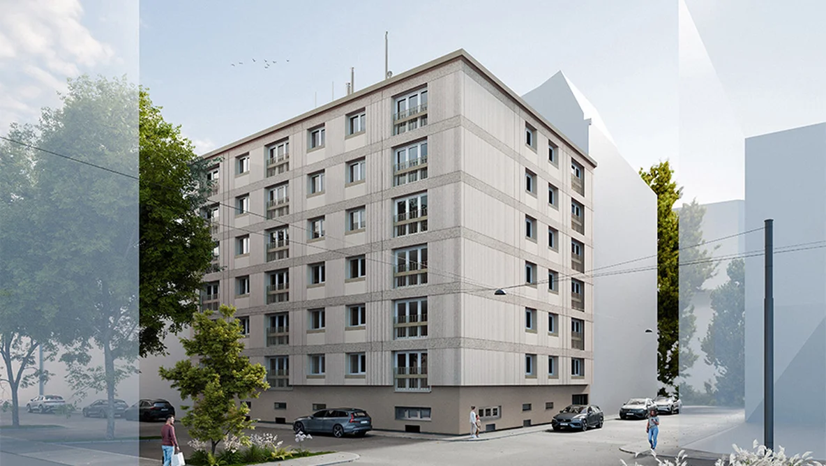 Ein siebenstöckiges Wohnhaus an einer Straßenecke, umgeben von Bäumen und geparkten Autos, mit Menschen, die in der Nähe spazieren gehen.